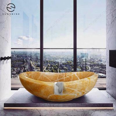 China Freestanding Luxury Natural Marble Onyx Freestanding Soaking Bathtub for sale