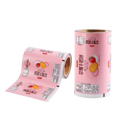 China Moisture Proof Wrapping Rose Printed Automatic Roll Film For Candy Film Pouch Packaging Lamination Roll Film for sale