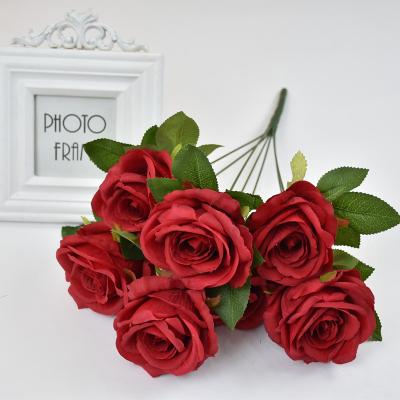 China Hot Selling 7 Head 60% 18 Inch Silk Rose Flower Bouquet Bush In Bulk Wedding Decoration Artificial Silk for sale