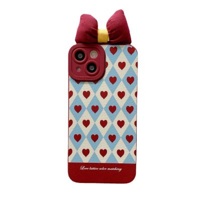 China Shockproof Red Bow Rhombus Heart Phone Case Top Cover for sale