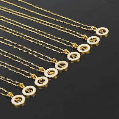 China TRENDY Stainless Steel Round Hollow Capital 26 English Letter Pendant Necklace Gold Plated Inlaid Shell Necklace for sale