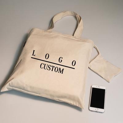 China Custom Printed Eco Friendly Washable Cotton Collapsible Folding Logo Pocket Drawstring Canvas Tote Bags for sale