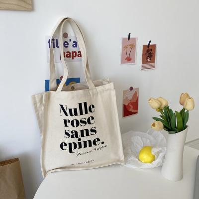 China Simple Cotton Handled Tote Bag Canvas Bag Custom Fashion Logo Printed Shopper Large Women for sale