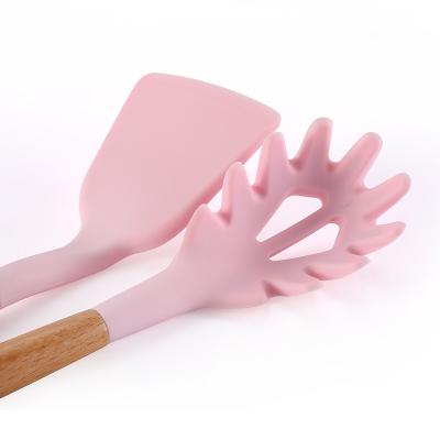 China Sustainable Wooden Handle Silicone Kitchenware Set 11 Piece Set Kitchen Pot Shovel Spoon Brush High Temperature Resistant Cooking for sale