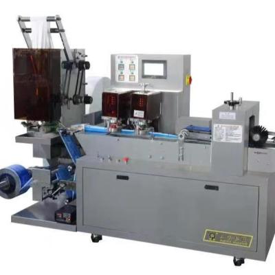 China Automatic Disposable Nonwoven Fabric Four Sides Sealing Wet Wiper Cloth Wet Packing Machine for sale