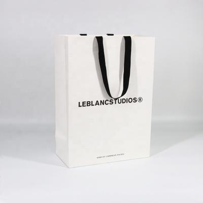 China Wholesale Printing Logo Ribbon Rope Embedded Grosgrain Shopping Luxury Paper Bag Recyclable for sale