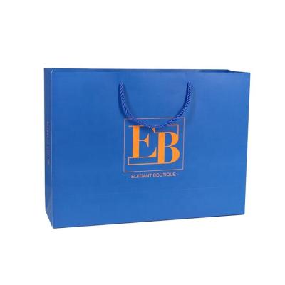 China Recyclable Fashion Sports Clothing Store Unique Custom Branded Bolsas Women Products Reusable Shopping Shoes Paper Bags With Logo for sale