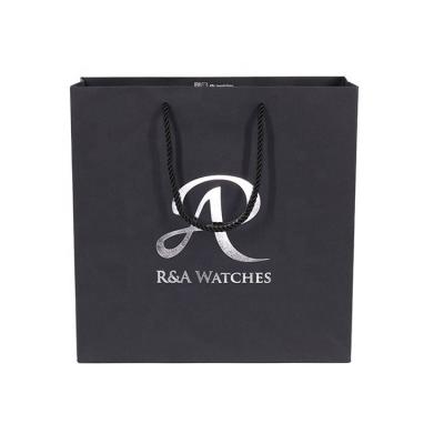 China Recyclable Custom Logo Gift Bag Shiny Clothes Branded Shopping Paper Bags With Handles for sale