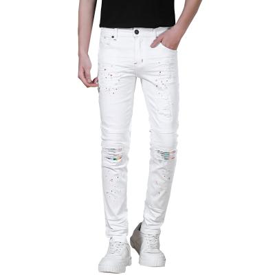 China Wholesale Breathable Mens Stretch Black Jeans Motorcycle Pants White Paint Spray Ripped Jeans For Man for sale