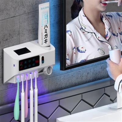 China ABS Sterilization High Quality Smart Portable UV-C Toothbrush Special Design Toothbrush Holder With Automatic Toothpaste Squeezer for sale