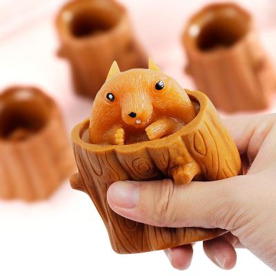 China Eco-friendly material decompress and exhale squirrel toy squeeze toys tree stump hand squeeze toy delicate pinch for sale