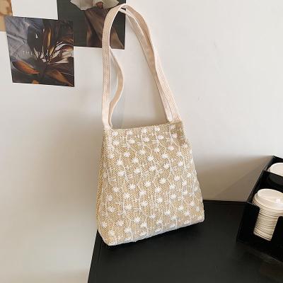 China Newest Fashinable 2021 Summer Latest Korean Fashion Straw Basket Bag Large Bucket Weaving Shoulder Designed Tote Bag for sale