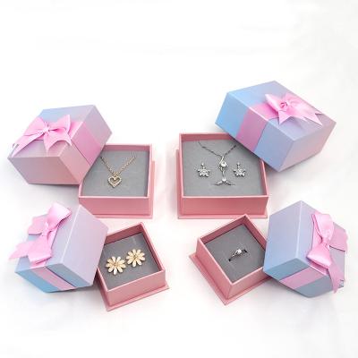 China Ornament Packaging Box Custom Foil Print Logo Paper Packaging Box Display Ring Necklace Earring Gradient Jewelry Box for sale