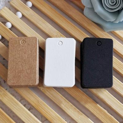 China Small Rectangular 2x3.3cm Labels Paper Card Tags Custom Logo Blank Gifts Kraft Cards Christmas Jewelry Hang Tag Customized Size for sale