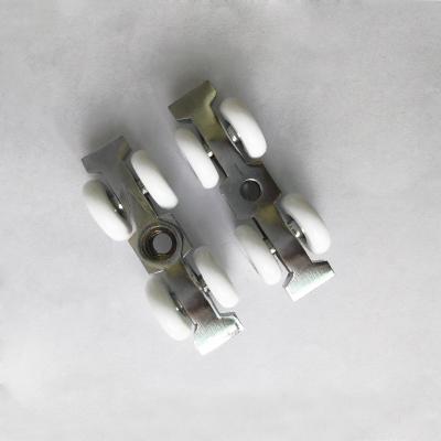 China 4 Wheels Sliding Door Low Noise Solid Zinc Alloy Roller Bearings for sale