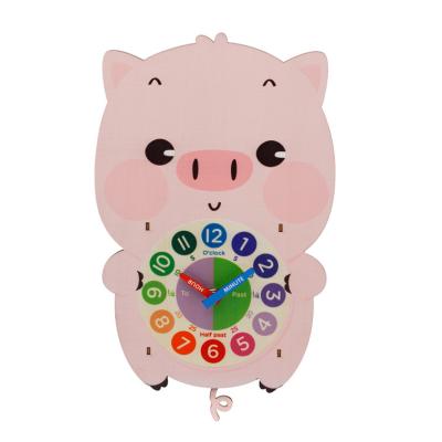 China Custom ODM Cartoon Novelty Small Wooden Hand Craft Pink Swine Pendulum Clock for sale