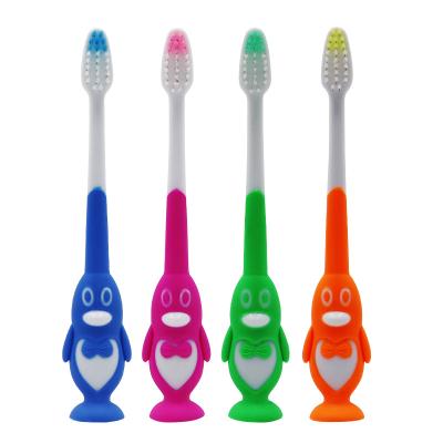 China 2020 Cartoon Design Home Sweet Stiffens Toothbrush Children / Cute Kid Penguin Suction Cup Toothbrush for sale