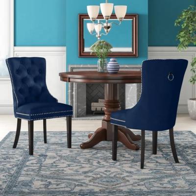 China Luxury Indoor Velvet Fabric Back Ring Frinish Metal Frame Dining Chair for sale