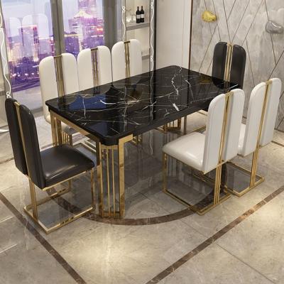 China Luxury Modern Use Luxury Dining Table Set 8 6seaters Black Marble Luxury Dining Set for sale