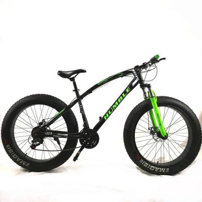 China New carbon steel frame 21 speed double tire 4.0 fat bike disc brake beach bicycle snow bike for sale