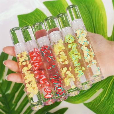 China Set natural lip care lip weight loss fruit serum moisturize soften soft waterproof makeup lasting lip tramsparant oil for sale