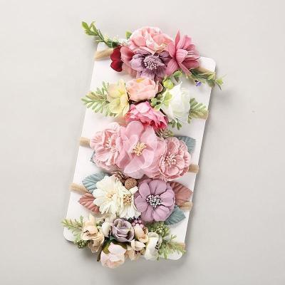 China Wholesale Sweet Newborn Flower Hair Ornament Baby Encanto Headband Bohemia Imitation Flower Headband for sale