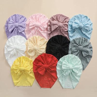 China Wholesale Hair Ornament Hollow Out Bow Knot Baby Turban Headband Fabric Soft Breathable Cloth Hat Turban for Babies and Boys for sale