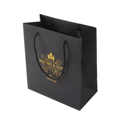 China New Recyclable Style CYMK Printing Super Market Luxury Small Paper Shopping Bag PAG Paper For Clothing for sale