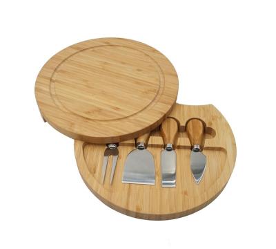 China Disposable Round 4-Piece Cheese Board Cutting Board and Bamboo Cutlery Set with Slide-Out Drawer for sale