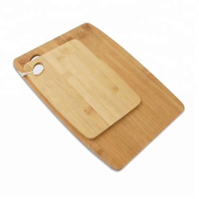 China Sustainable Portable 2 Pieces Bamboo Cutting Board Sets Wooden Chopper With Hanging Hole For Kitchen, Restaurant, Hotel for sale