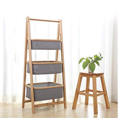 China Durable Multi-Tier Bamboo Shelf with 2 Polyester Laundry Basket for Storage and Organization for sale