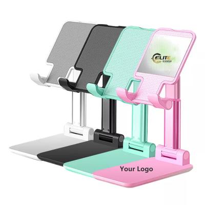 China New Mini Folding Colorful Mobile Phone Stand Portable Adjustable Tensing Desktop Tablet Phone Holder for sale