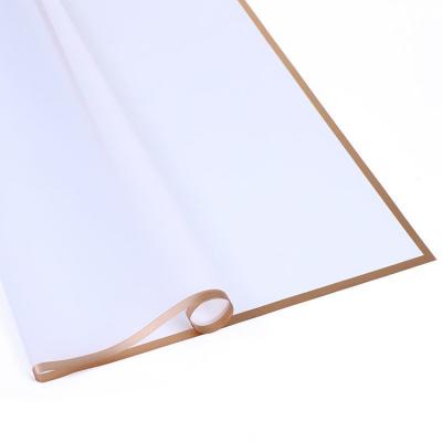 China Waterproof Jelly Film Flower Paper Flower Wrapping Paper Package Waterproof Paper With Gold Edge for sale