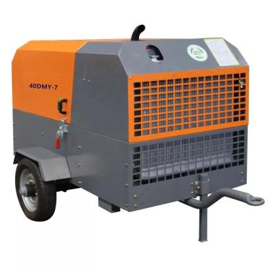 China 40kw 7bar 185cfm 4m3/min diesel engine lubricated screw air compressor with two wheels and covers for sale