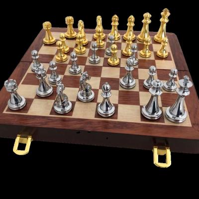 China Luxury High Quality Wooden Chess Set Silver and Gold Chess Board Custom Steel Chess Set for sale