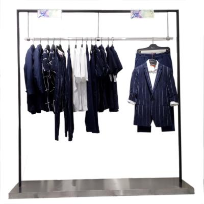 China Retail Store Fabric Display Rack Stand Environmental Friendly Metal For Boutique Store for sale