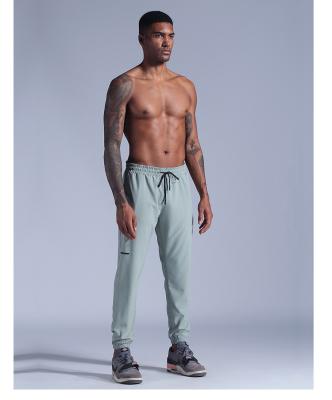 China 2021 New Design Solid Color Breathable Sports Pants Men's Casual Quick-Dry Jogger Panties for sale