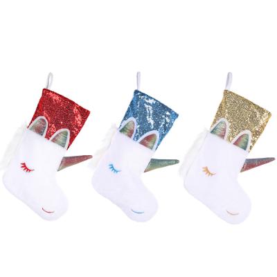 China Flannel + Nonwoven Fabric 2021 New Unicorn Christmas Stocking Decoration Gift Bag High End Home Hotel Christmas for sale