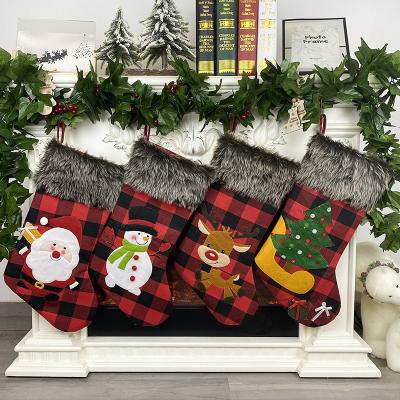 China Exquisite high qualtity nonwoven plush fabric+plush present bag ornaments Christmas tree ornament stockings Christmas indoor decor for sale