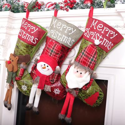 China Christmas Home Decor Merry Christmas Letter Printing Leg Cartoon Toy Long Bangs Xmas 2021 Xmas Toy Sublimation Gift Bag for sale