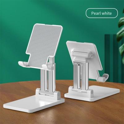 China Adjustable Aluminum Double Tube Weight Folding Lift Tablet Holder 7 To 14inch Support Desk Stand for sale