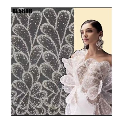 China New Exquisite handmade beaded lace embroidery lace fabric wedding dress Senegal fabric women clothing french tulle lace fabric for sale