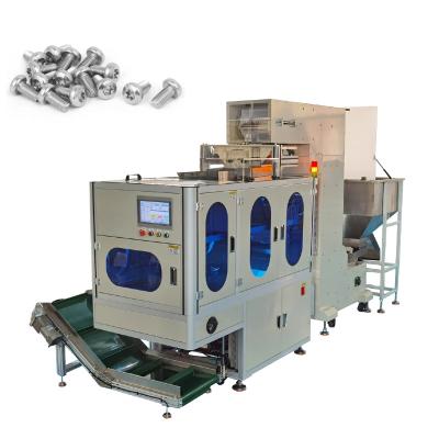 China Plastic Screw Nut Nails Weighing Packaging Machine With Feeding Machine for sale