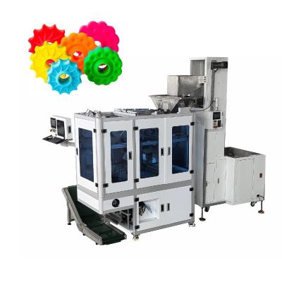 China Intergrated Electric Nuts Shaft Visual Counting Packing Machine For Silica Gel Product for sale