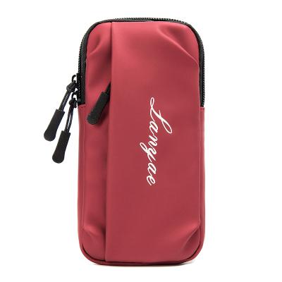 China Water proof sports arm bags men and women outdoor sports unisex mobile phone arm running bag for sport for sale