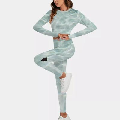 China Breathable All Over Print Gym Wear Ladies Yoga Tracksuits Custom Womens Sport Set With Backless Top And Gaiters for sale