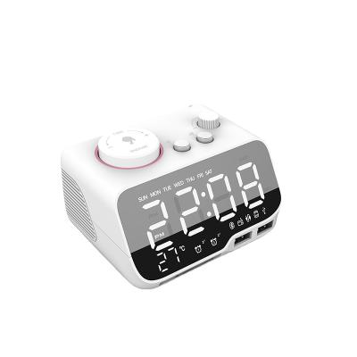 China 2021 Mini Alarm Clock Portable Wireless Charger LED Mirror BT Speaker Christmas Radio Alarm Clock Gifts for sale