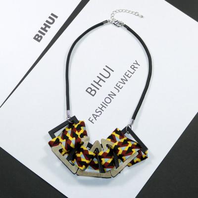 China Europe and America unique design jewelry wholesale fashion color geometric wood ribbon woven chunky PU chain charm necklace for women short neckerchief for sale