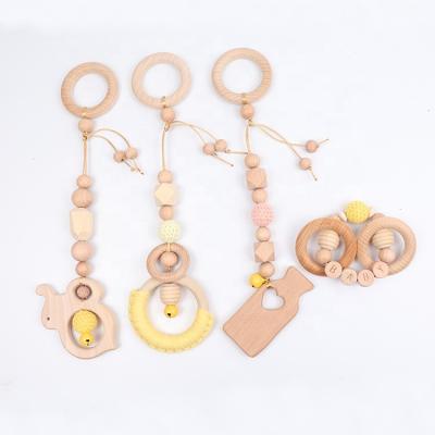 China Musical 4 Pcs Baby Crib Pendants Gift Set Cute Hanging Toys Play Gym Fitness Baby Play Gym Wooden Rattle Hanging Toy for sale