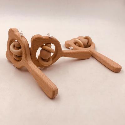 China Safe Customize Logo Organic Baby Musical Wooden Rattle Toy Teething Beech Baby Teether Rattles Wood for sale